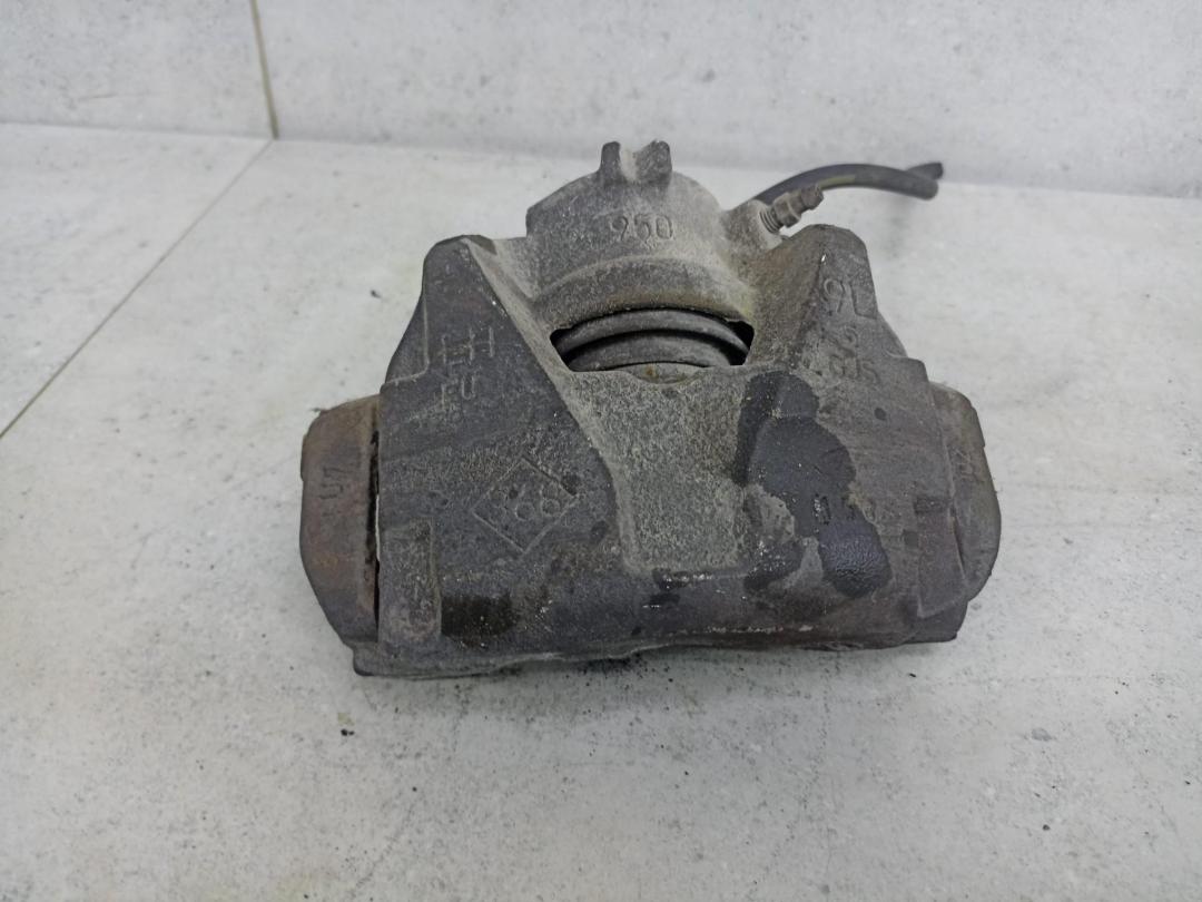 суппорт передний левый Renault Duster 1 поколение 2010, 402014636R - фото №1