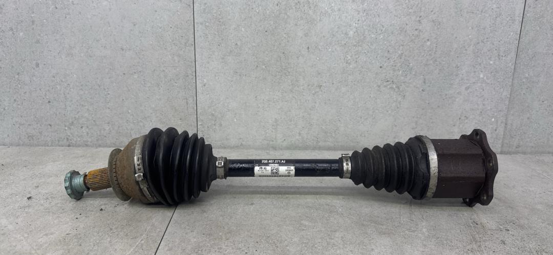 полуось передняя левая (приводной вал, ШРУС) Volkswagen Passat B6 (2005 - 2010), 2Q0407271 - фото №1