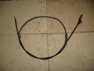 трос капота Volkswagen Caravelle 5 2006, 2.5 л., TDi, AXD, дизель, МКПП, красный, минивэн, передний привод, 7H1823530A