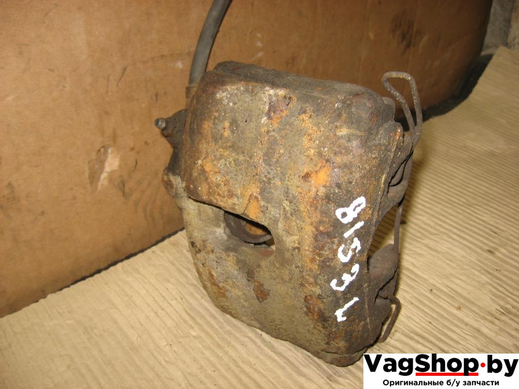 суппорт Volkswagen Passat B6 2010, 1.4 л., TSI, бензин, газ, МКПП, черный, универсал, передний привод - фото №1