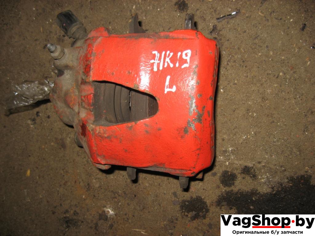 суппорт передний левый Volkswagen Golf Plus 1 поколение 2007, 1.9 л., TDi, BLS, дизель, МКПП, серебро, хетчбэк 5 дв., передний привод - фото №1