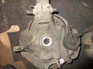 кулак поворотный левый Volkswagen Passat B6 2006, 2.0 л., TFSI, BWA, бензин, МКПП, серый, универсал, передний привод