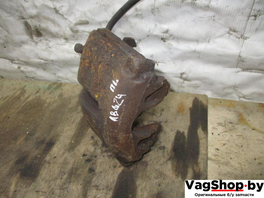 суппорт передний левый Volkswagen Passat B6 2009, 2.0 л., TDi, CBA, дизель, АКПП, белый, седан, передний привод - фото №1