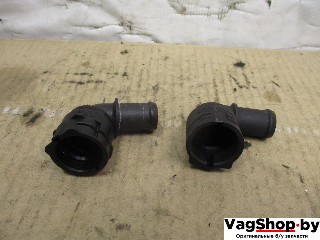 фланец (тройник) системы охлаждения Volkswagen Tiguan 1 поколение 2010, 2.0 л., TDi, CFF, дизель, МКПП, черный, внедорожник 5 дв., передний привод, 7M0122291, 1K0122291J - фото №1