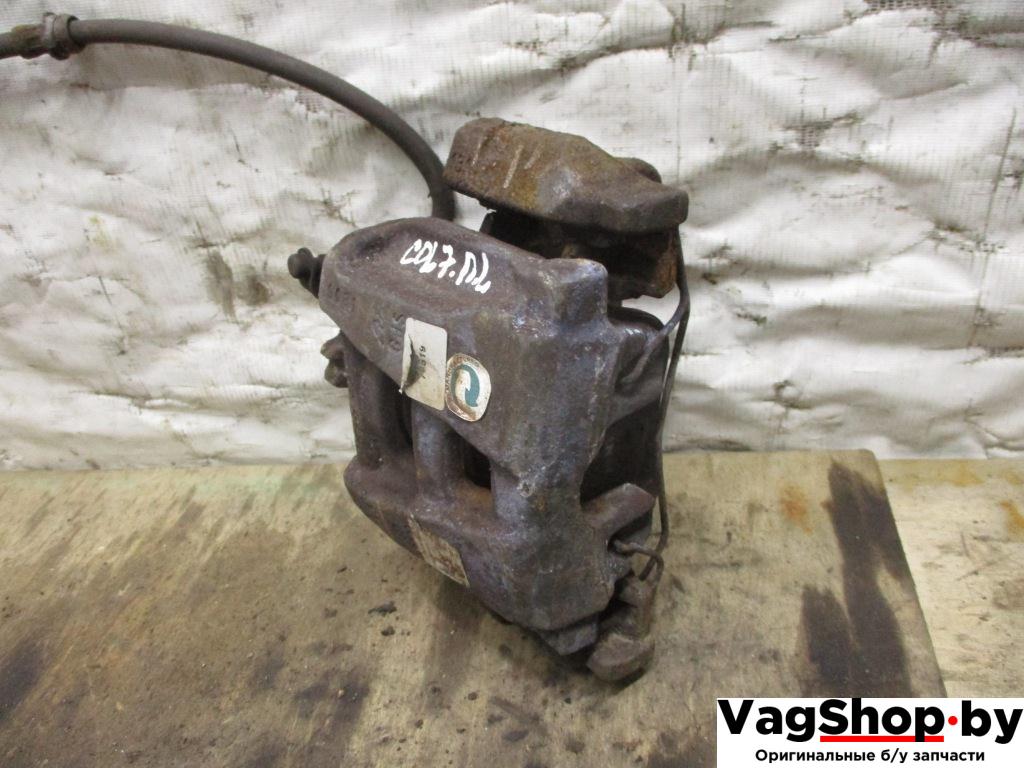 суппорт передний левый Volkswagen Tiguan 1 поколение 2010, 2.0 л., TDi, CFF, дизель, МКПП, черный, внедорожник 5 дв., передний привод - фото №1