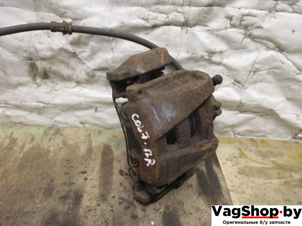 суппорт передний правый Volkswagen Tiguan 1 поколение 2010, 2.0 л., TDi, CFF, дизель, МКПП, черный, внедорожник 5 дв., передний привод - фото №1