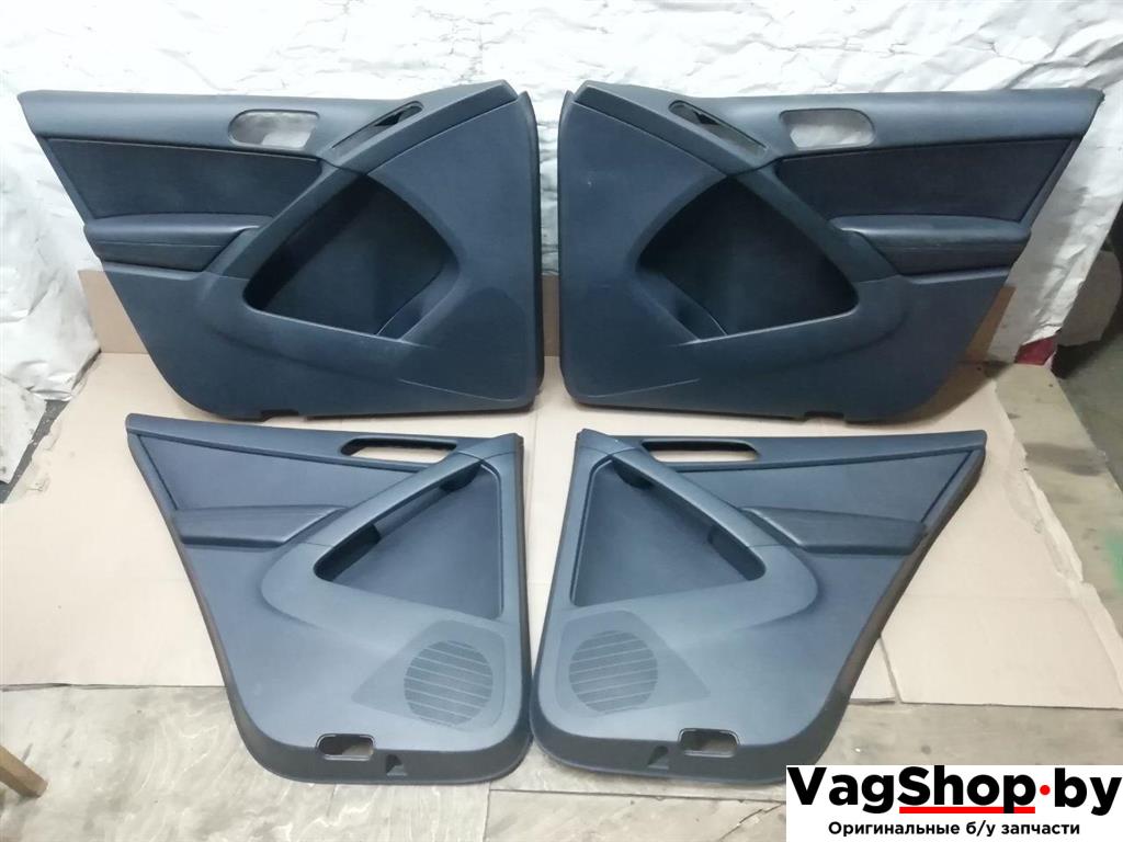 Обшивка двери (дверная карта) комплект Volkswagen Tiguan 1 поколение 2010, 2.0 л., TDi, CFG, дизель, МКПП, серебро, внедорожник 5 дв., полный привод - фото №1
