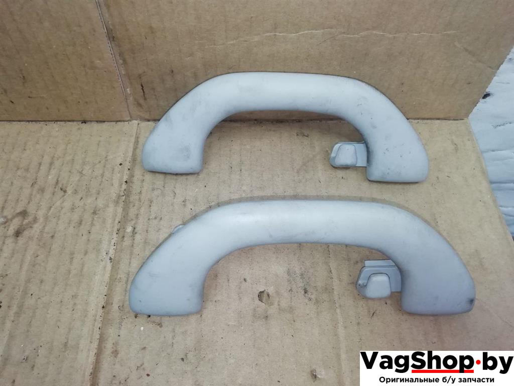 ручка внутренняя потолочная Volkswagen Passat B7 2011, 2.0 л., TDi, CFF, дизель, МКПП, черный, универсал, передний привод, 1K0857607N - фото №1