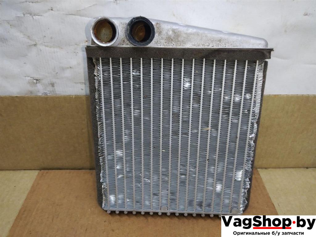 радиатор отопителя (печки) Volkswagen Golf 5 поколение 2007, 1.9 л., TDi, BLS, дизель, МКПП, черный, универсал, передний привод, 1K0819031D - фото №1