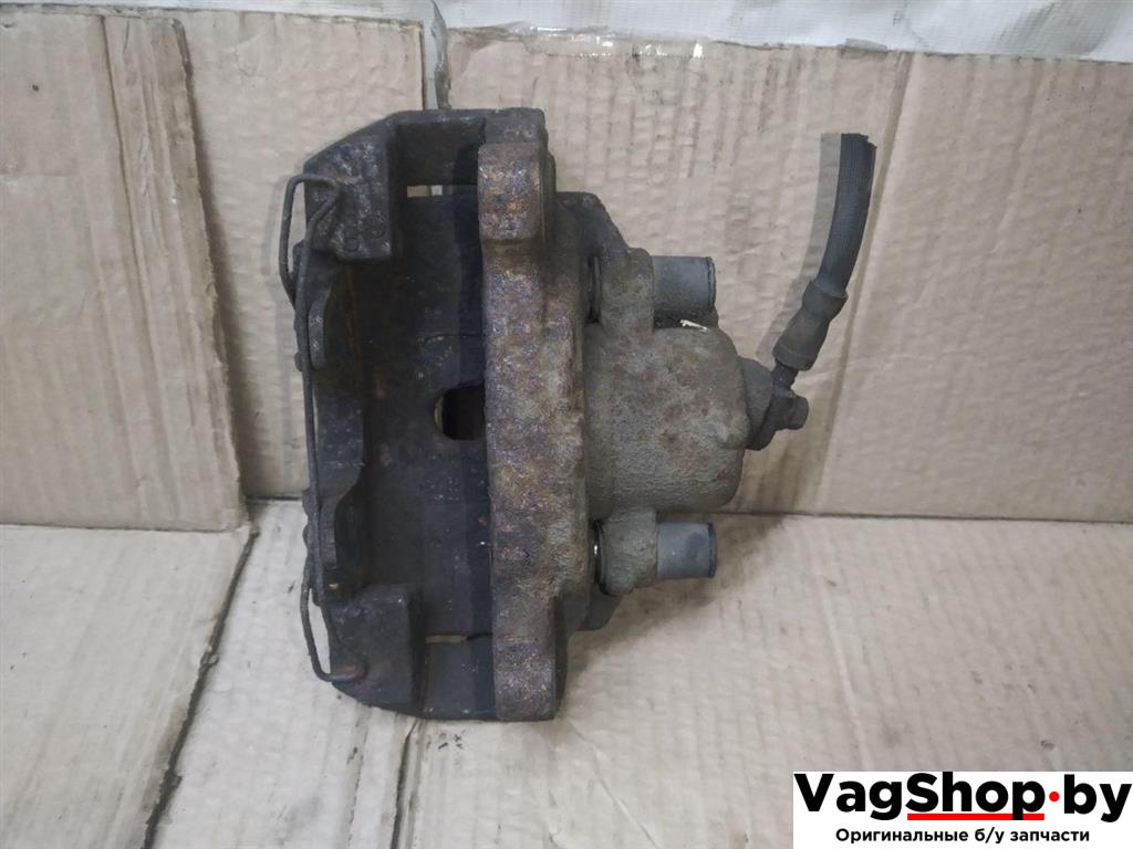 суппорт передний левый Volkswagen Golf Plus 2 поколение 2010, 1.6 л., TDi, CAY, дизель, АКПП, красный, хетчбэк 5 дв., передний привод - фото №1