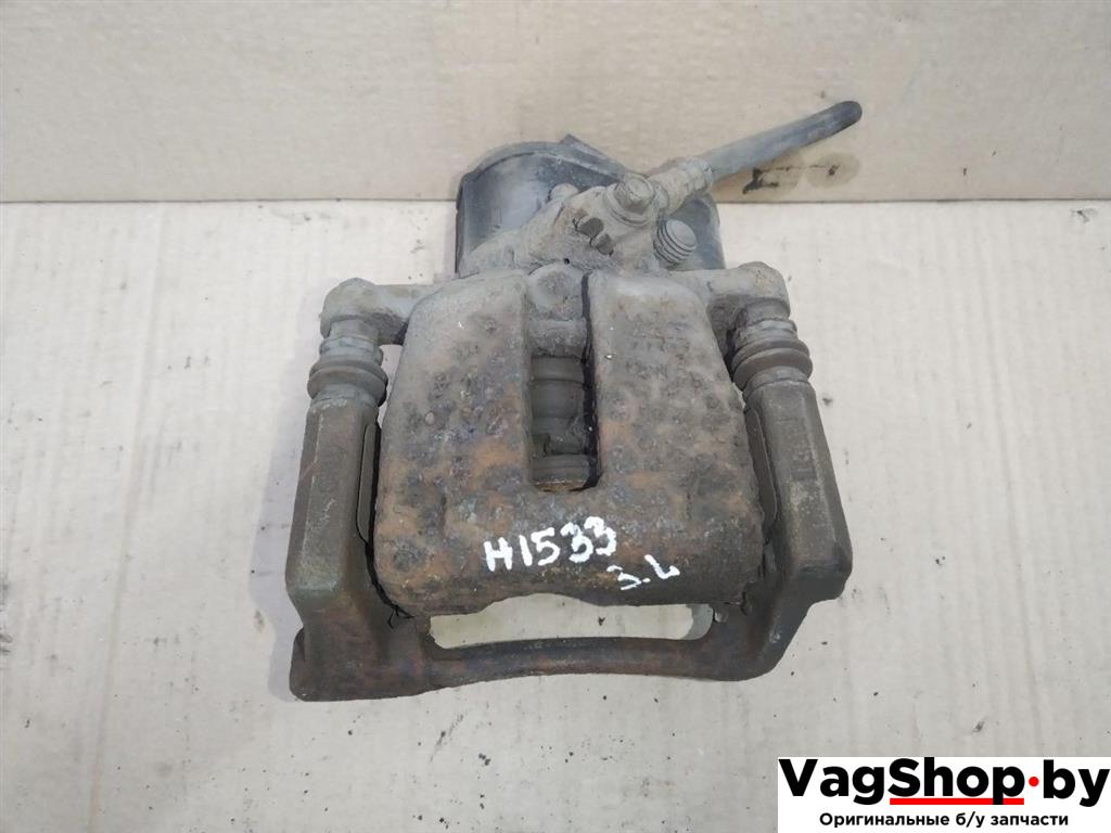 суппорт задний левый Volkswagen Sharan 2 поколение 2011, 2.0 л., TDi, CFF, дизель, МКПП, черный, минивэн, передний привод - фото №1