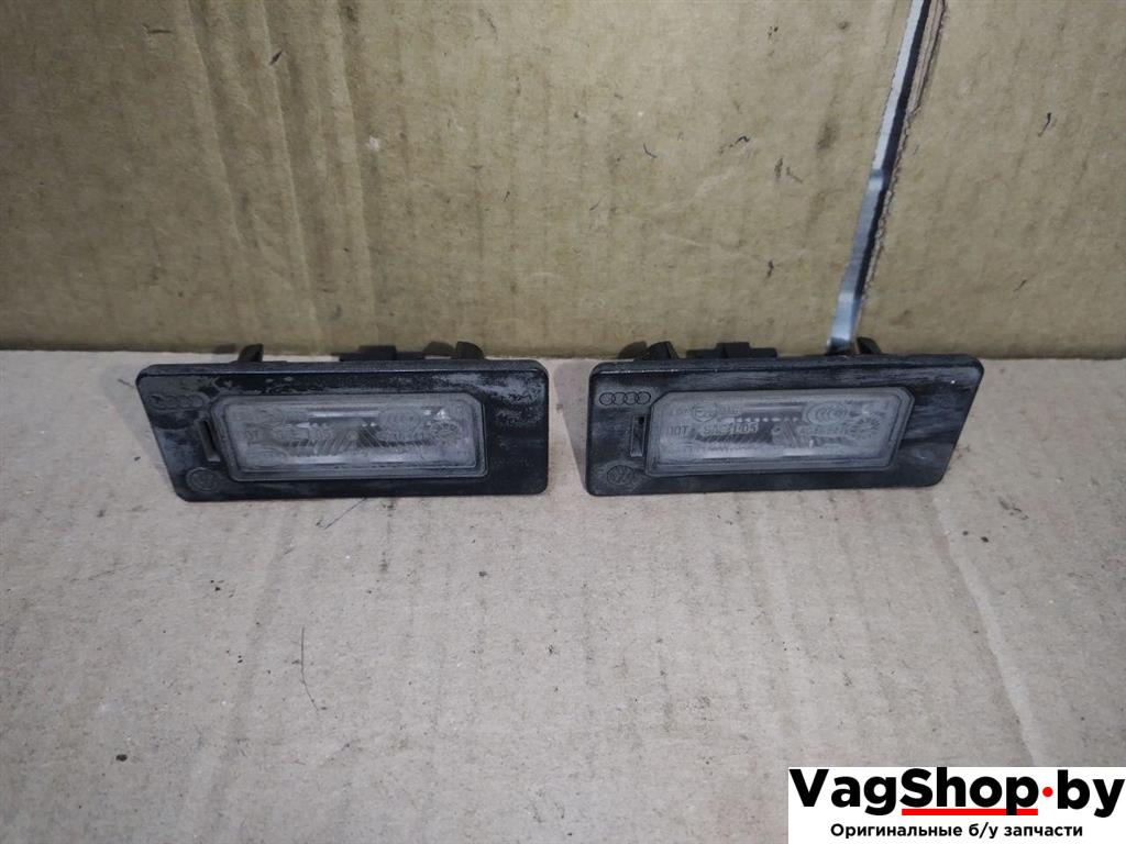 подсветка номера Audi A4 B8/8K 2010, 2.7 л., TDi, CGK, дизель, МКПП, белый, седан, передний привод, 8T0943021 - фото №1