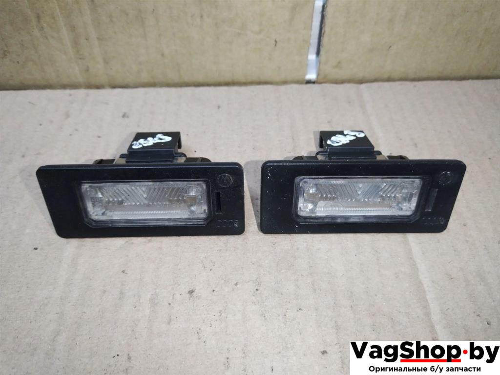 подсветка номера Audi A4 B8/8K 2010, 2.7 л., TDi, CGK, дизель, МКПП, белый, седан, передний привод, 8T0943021 - фото №1