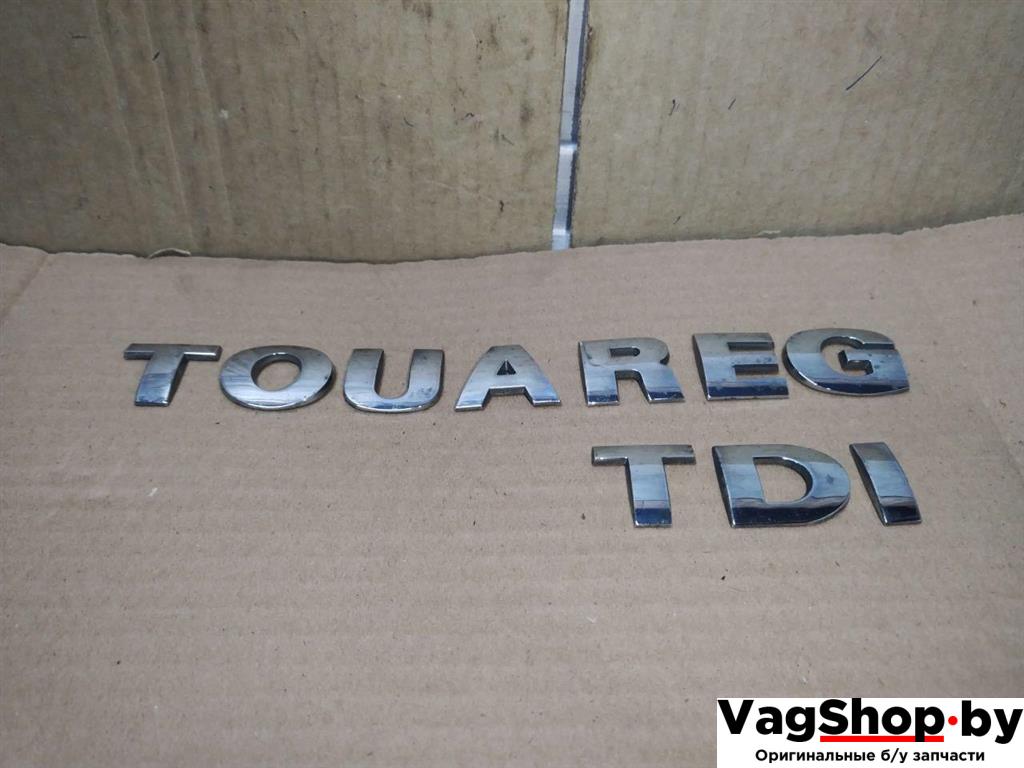 эмблема Volkswagen Touareg 1 поколение 2006, 2.5 л., TDi, BAC, дизель, АКПП, синий, внедорожник 5 дв., полный привод - фото №1