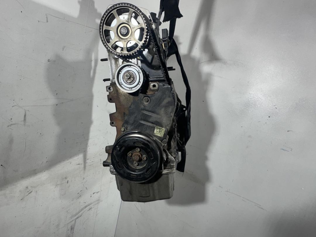 двигатель Volkswagen Caddy 3 поколение 2009, 2.0 л., бензин, AXA, BSX - фото №1