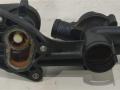 корпус термостата Volkswagen Golf 6 поколение 2010, 1.4 л., TSI, бензин, хетчбэк 5 дв., 03C121118D, 03C121111P, 03C121026AC, BLG, BMY, CAX, CDG, CAV, CTH, 03C121111T, 03C121111AB, 03C121121D, 03C121026S, 03C121026AF - фото №3