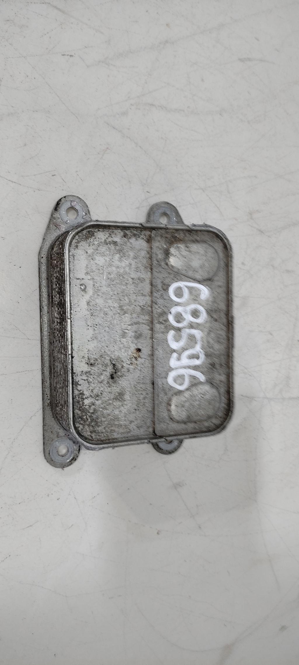 радиатор масляный Volkswagen Caddy 4 поколение 2016, 1.4 л., бензин, минивэн, CPW, ., 04E117021H - фото №1