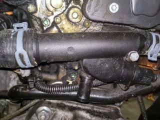 фланец (тройник) системы охлаждения Volkswagen Polo 4 поколение 2002, 1.4 л., дизель, 038121132D