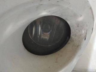 фара противотуманная левая Renault Clio 3 поколение [рестайлинг] 2011, 8200002469