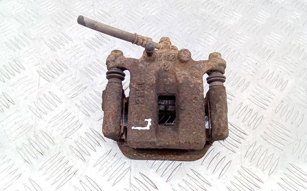 суппорт задний левый Nissan X-Trail T30 2002 - фото №1