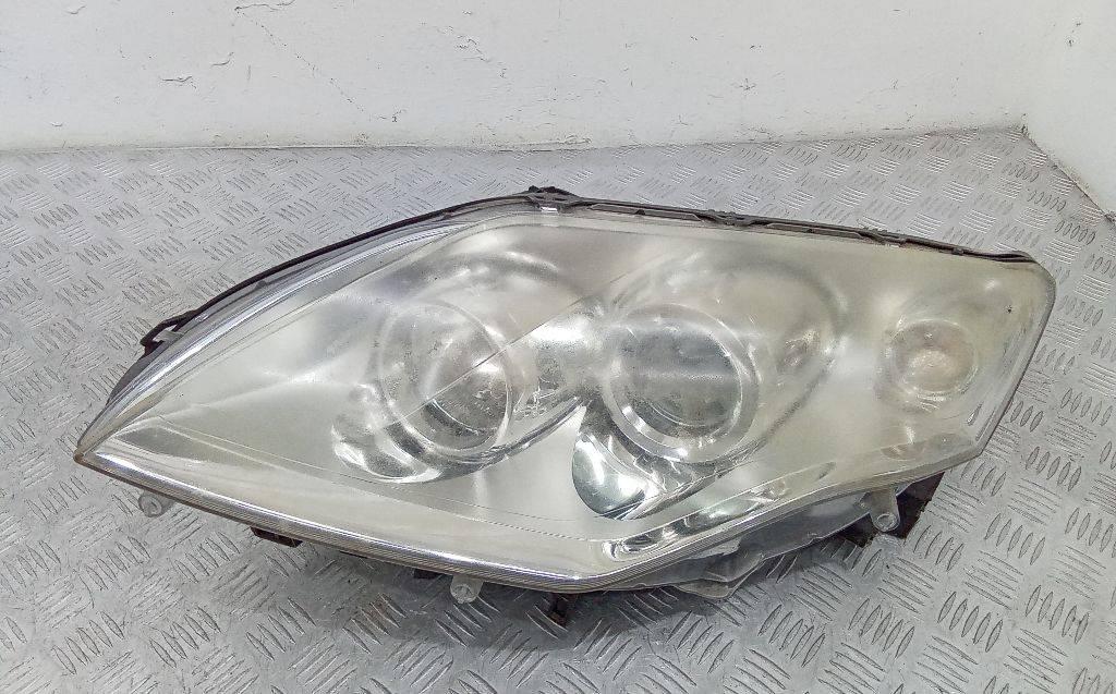 фара левая Renault Laguna 3 поколение 2008, 260600033R - фото №1