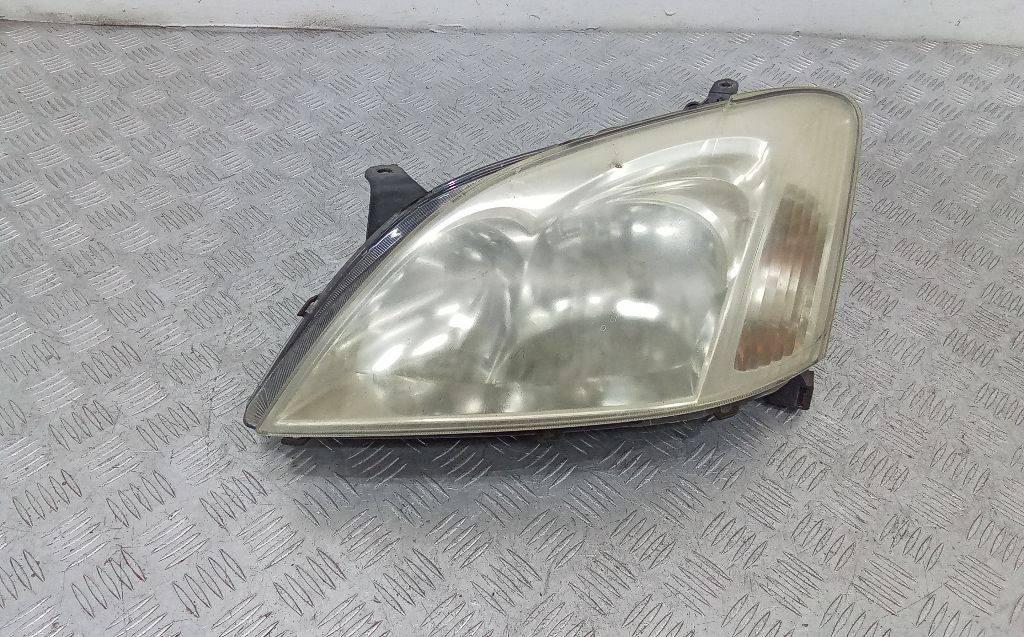 фара левая Toyota Corolla 9 поколение (E120/E130) 2003 - фото №1