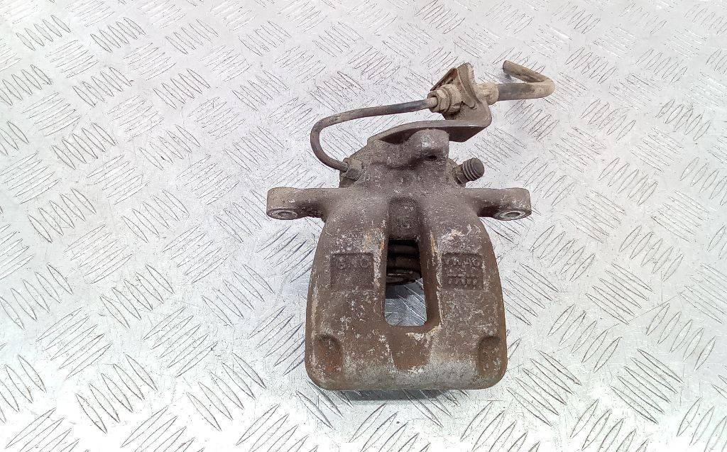 суппорт задний левый Volkswagen Passat B6 2008 - фото №1