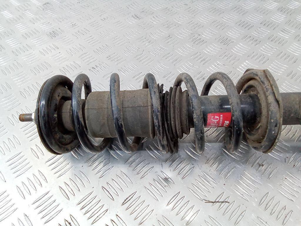 амортизатор передний правый Nissan Micra 4 поколение (K13) 2011, 1.2 л., бензин - фото №1