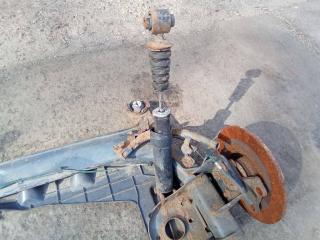 амортизатор задний Renault Laguna 3 поколение [рестайлинг] 2010