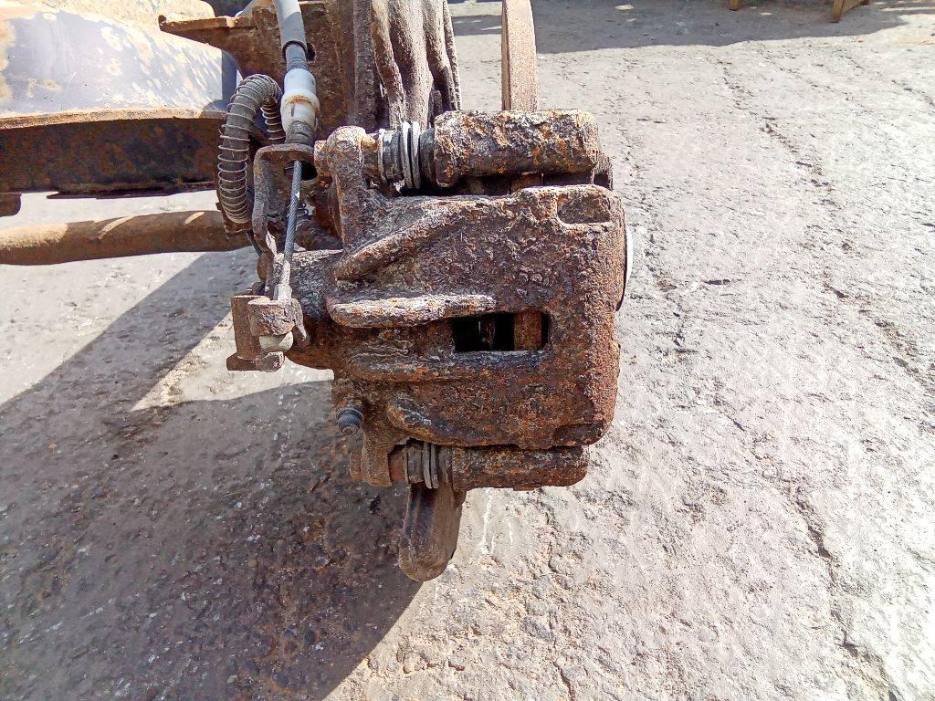 суппорт задний левый Renault Trafic 2 поколение 2004 - фото №1