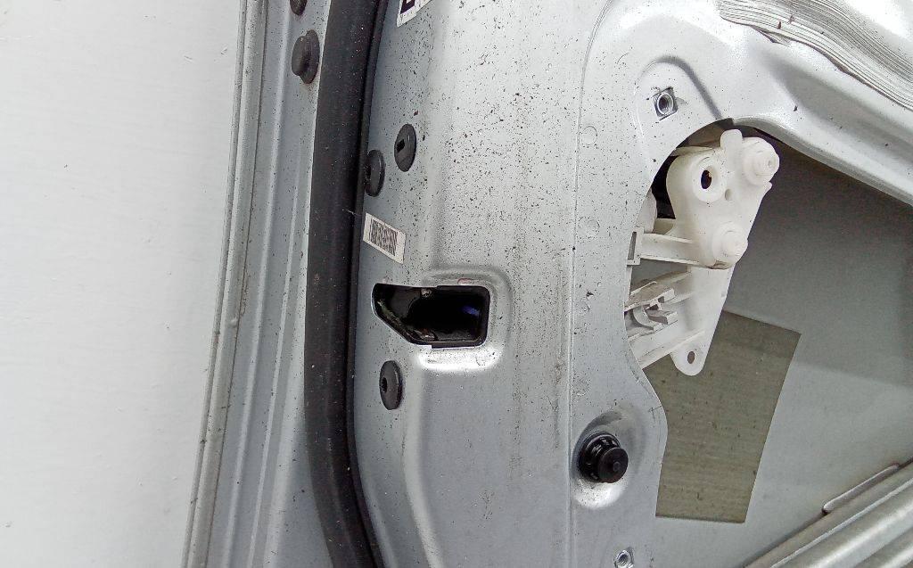 замок двери передней левой Volkswagen Passat B6 2005 - фото №1