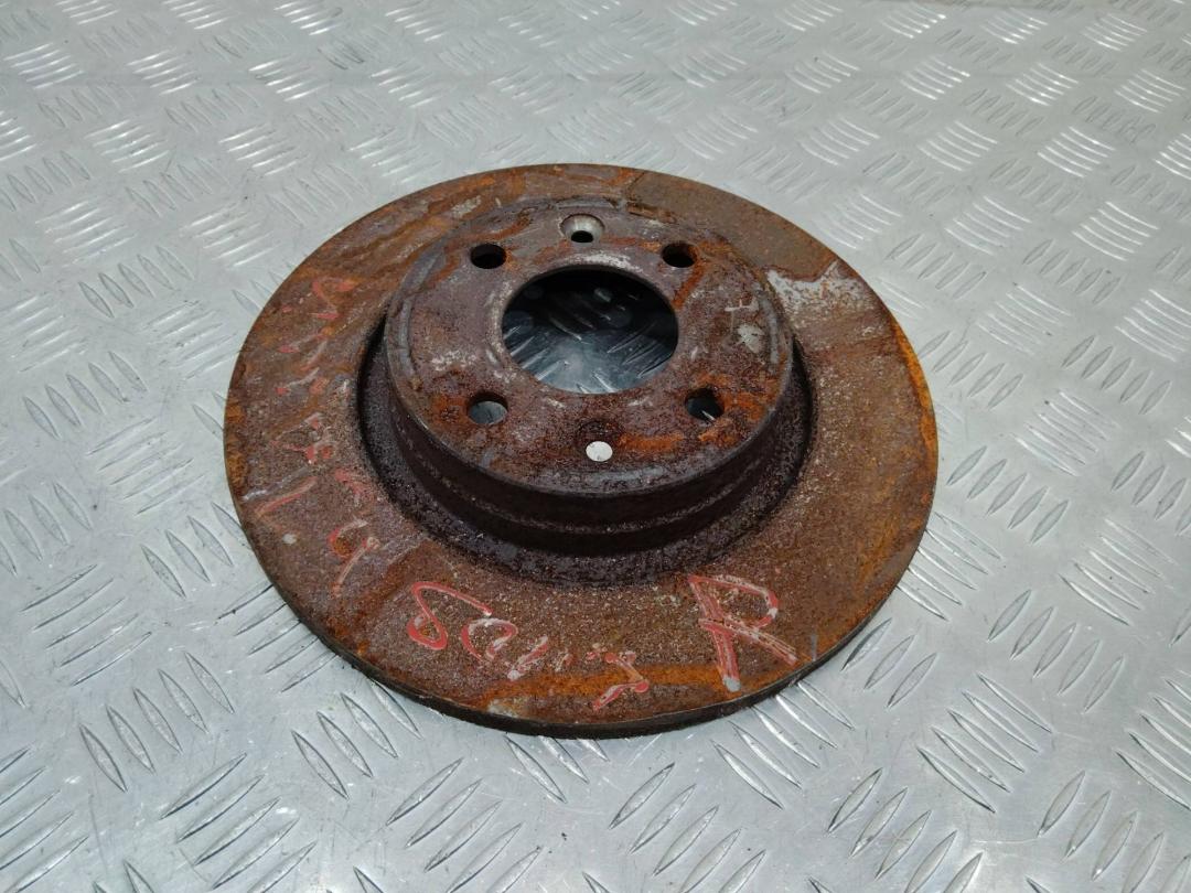 диск тормозной передний Dacia Sandero 1 поколение 2010, 1.4 л., бензин - фото №1