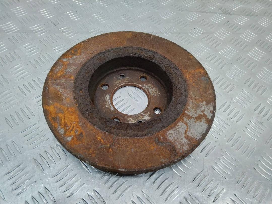 диск тормозной передний Dacia Sandero 1 поколение 2009, 1.4 л., бензин - фото №1