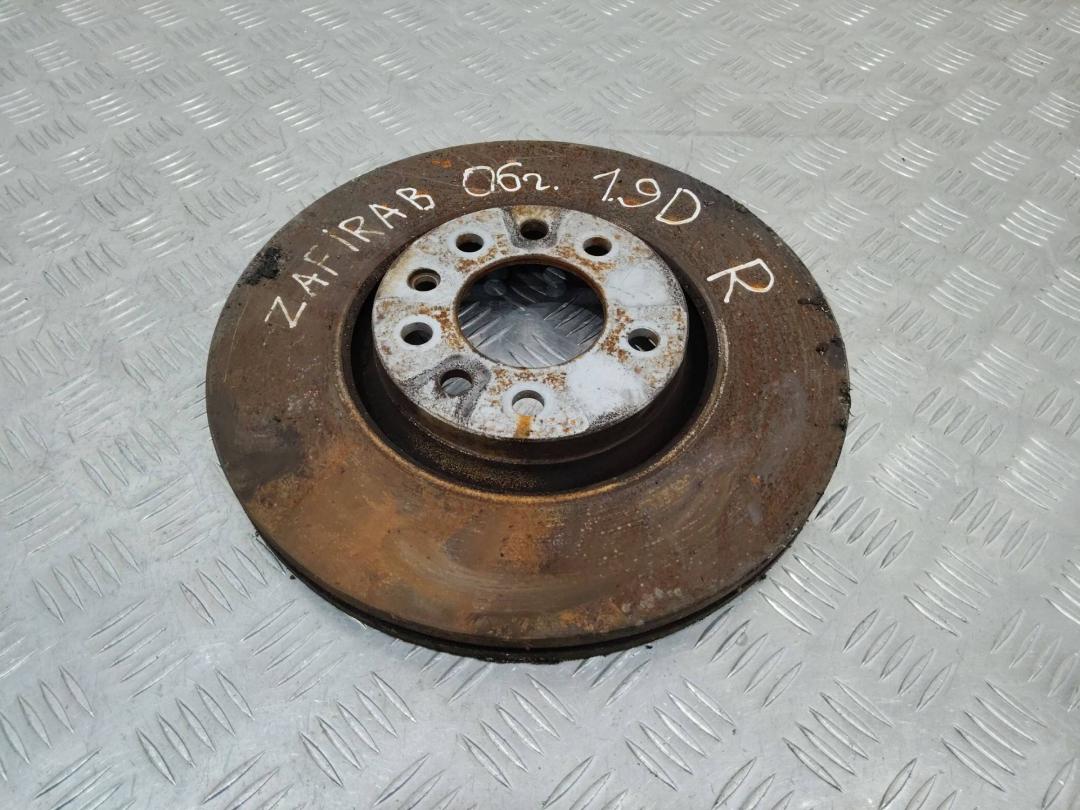 диск тормозной Opel Zafira 2 поколение (B) 2006, 1.9 л., дизель - фото №1