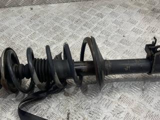 амортизатор передний левый Renault Sandero 1 поколение (2009 - 2014)