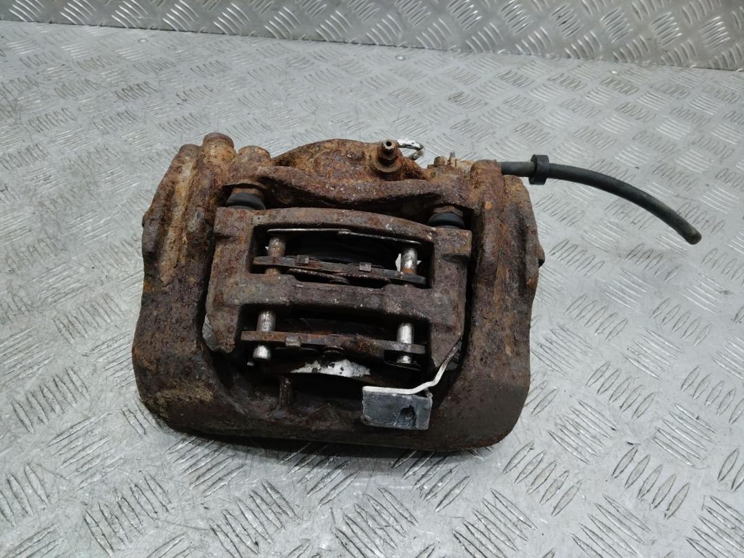 суппорт передний левый Volkswagen Transporter T4 1993 - фото №1