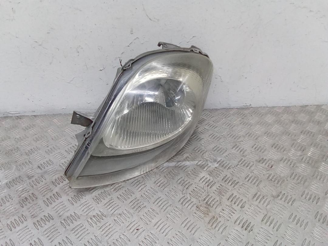 фара левая Renault Trafic 2 поколение 2005, 084421133L - фото №1