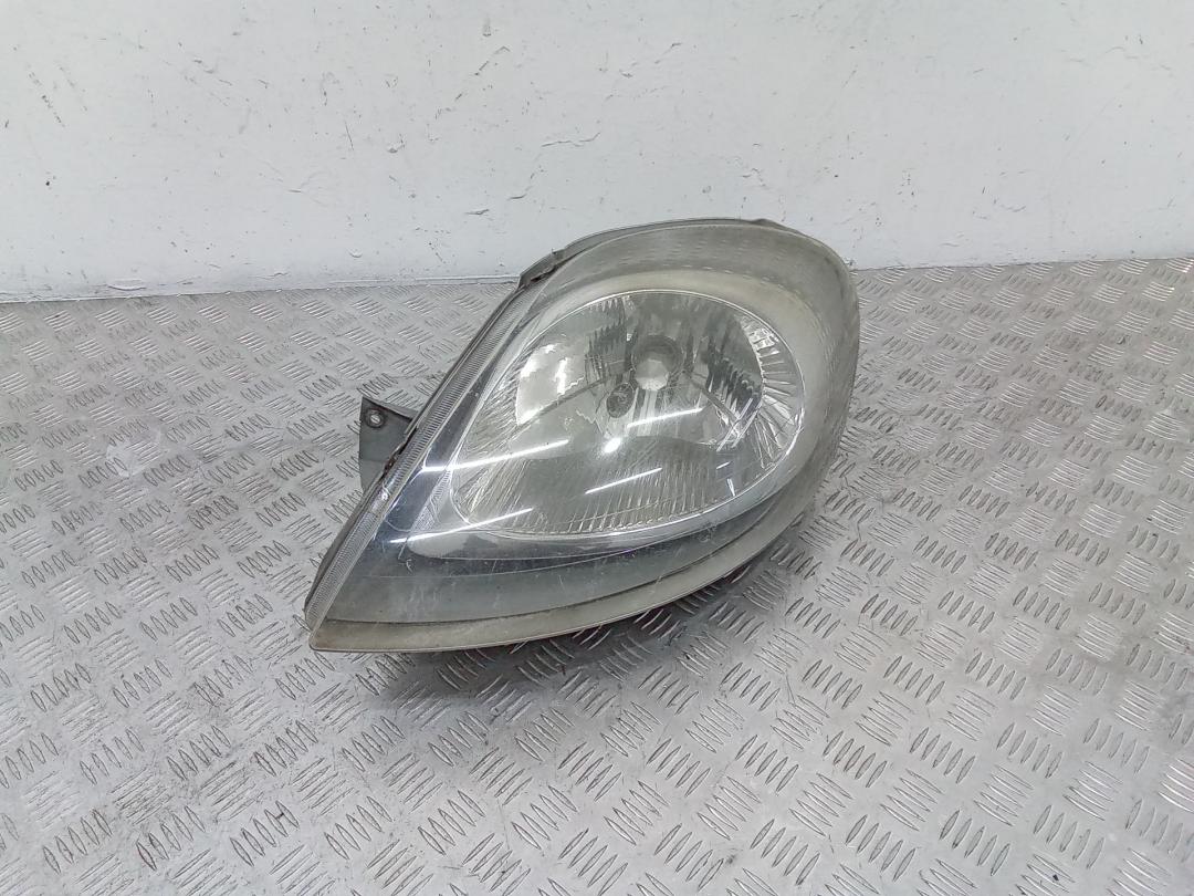 фара левая Renault Trafic 2 поколение 2004, 7700311373 - фото №1