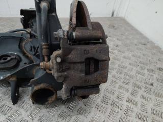 Суппорт тормозной задний (в балке) правый Nissan Juke YF15 [рестайлинг] 2014, 1.5 л., дизель