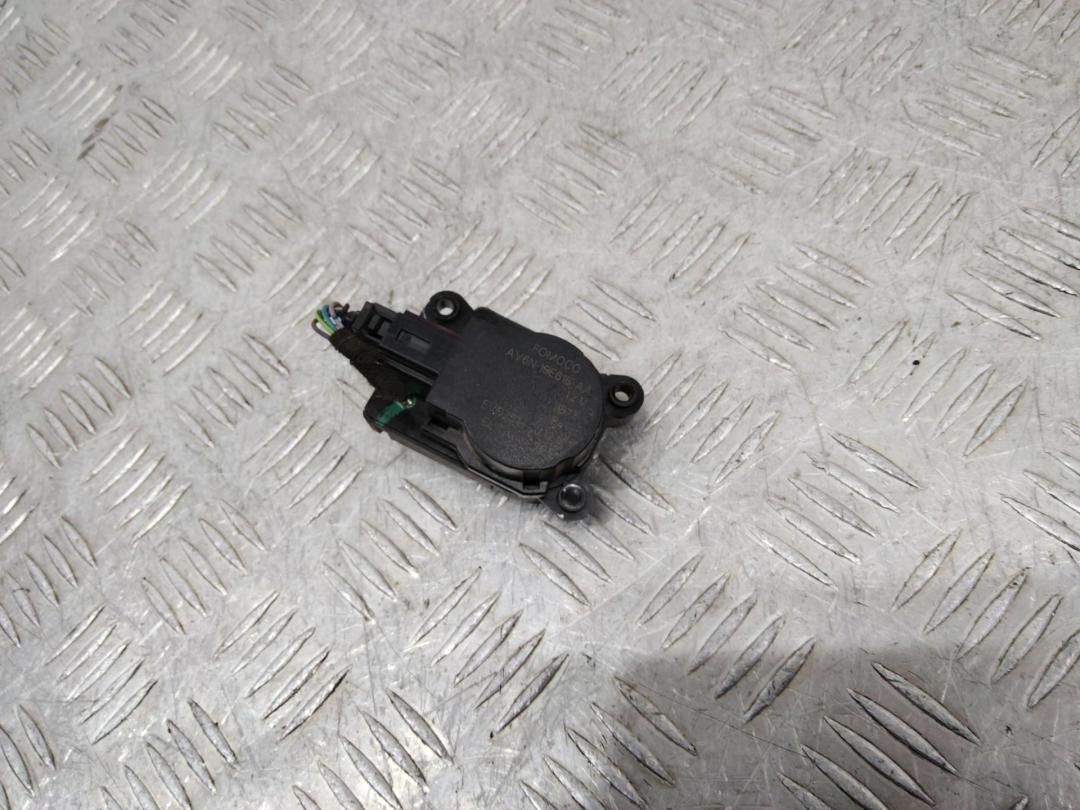 моторчик заслонки печки Ford Transit 8 поколение 2014, AV6N19E616AA - фото №1