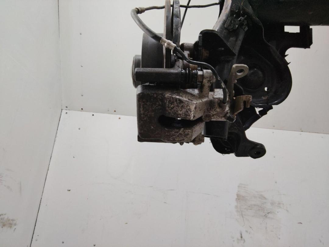 Суппорт тормозной задний (в балке) левый Renault Megane 4 поколение 2016 - фото №1