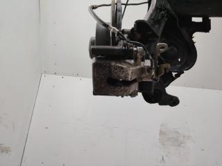 Суппорт тормозной задний (в балке) левый Renault Megane 4 поколение 2016