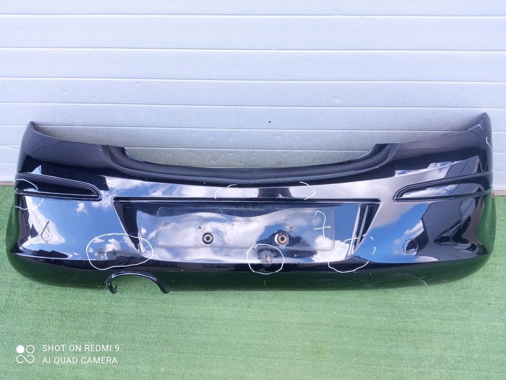 бампер задний Opel Corsa D (2006—2010) 2009, 1.4i Z14XEP, 13179916 - фото №1