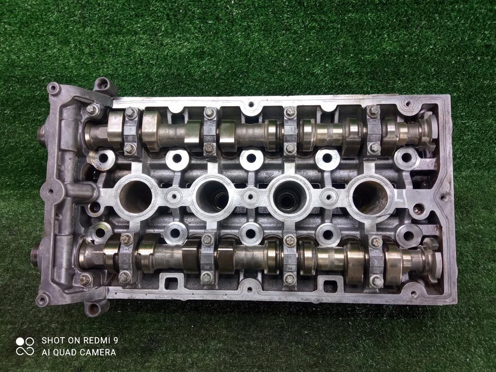 головка блока цилиндров Opel Astra J (2009—2012) 2011, 1.6i A16XER, 55559340 - фото №1