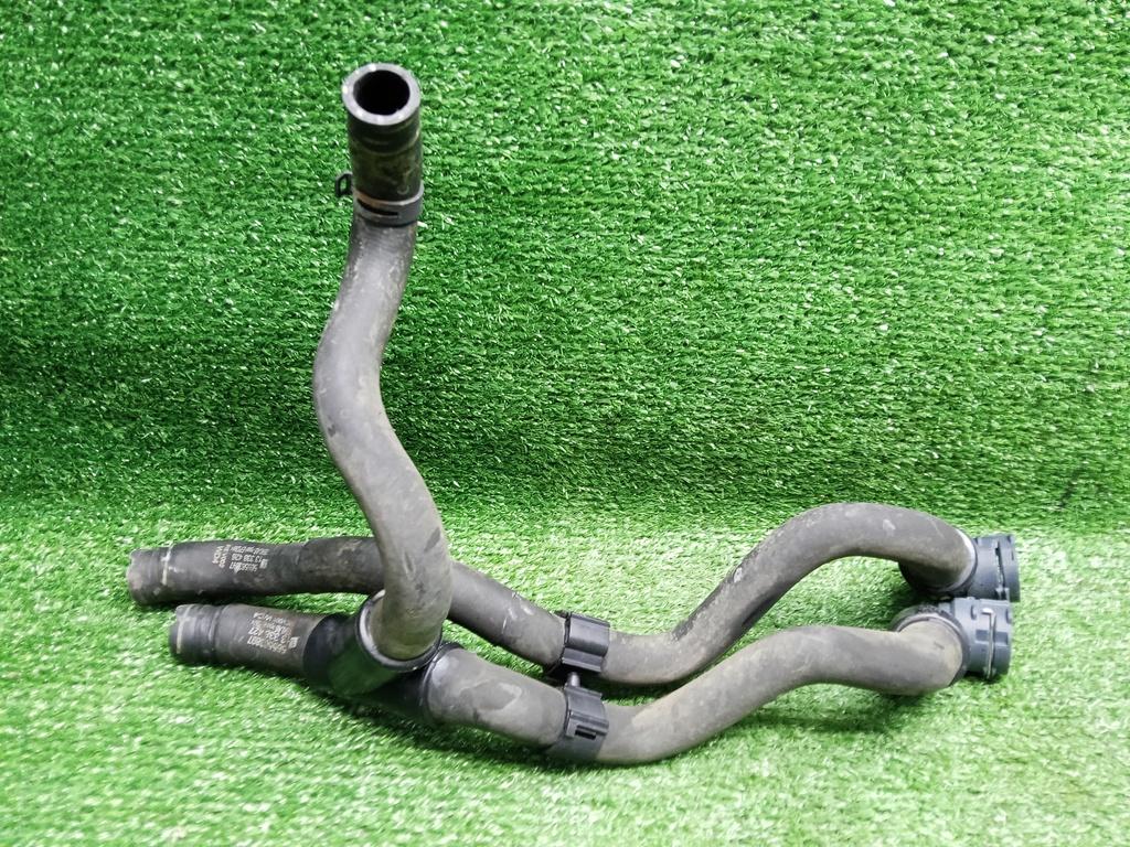 патрубок отопителя (печки) Opel Astra J рестайлинг (2012—2018) 2014, 1.6i A16XER, 13338427 - фото №1