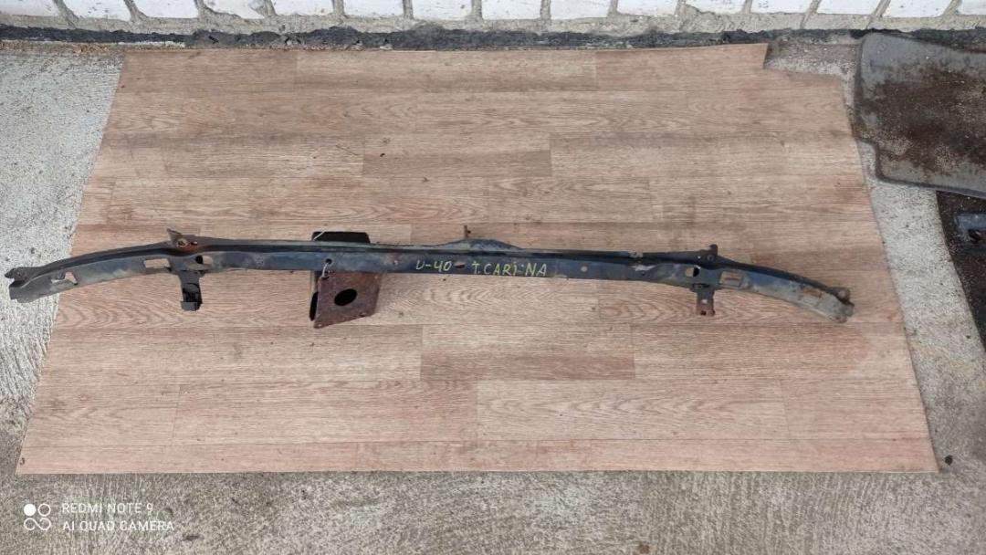 усилитель бампера переднего Toyota Carina T190 1995, 1.6 л., бензин, МКПП, седан - фото №1