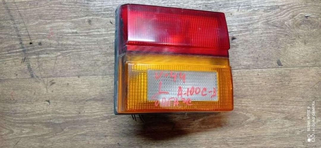 фонарь крышки багажника левый Audi 100 C3 1983, 2.1 л., бензин, МКПП, седан - фото №1