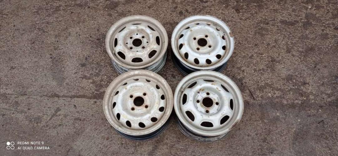 диск штампованный Opel Corsa A 1992, 1.2 л., бензин, МКПП, хетчбэк 5 дв. - фото №1