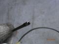 трос открывания лючка топливного бака Mitsubishi L300 2 поколение 1990, 2.5 л., дизель, МКПП, минивэн - фото №2