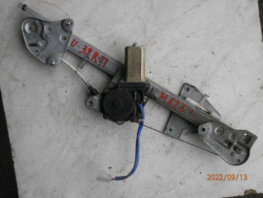 стеклоподъемник электрический передний правый Mazda 626 GE 1996, 2.0 л., TD, дизель, МКПП, седан - фото №1